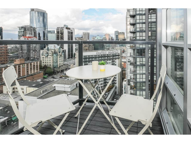 Furnished balcony with city view and modern furniture. - 2102 - 1199 Seymour Street, Vancouver Downtown