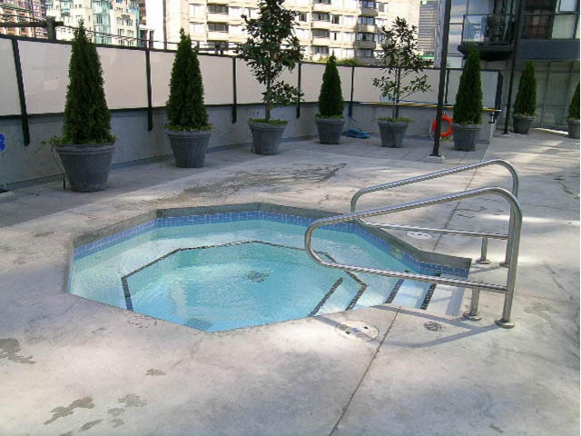 Furnished rooftop patio with trees, pool, and city view. - 2102 - 1199 Seymour Street, Vancouver Downtown