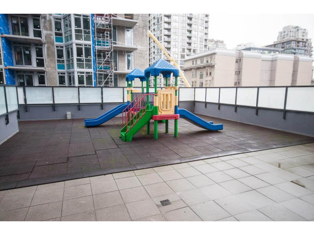 Bright rooftop patio with colorful playground and city views. - 2102 - 1199 Seymour Street, Vancouver Downtown