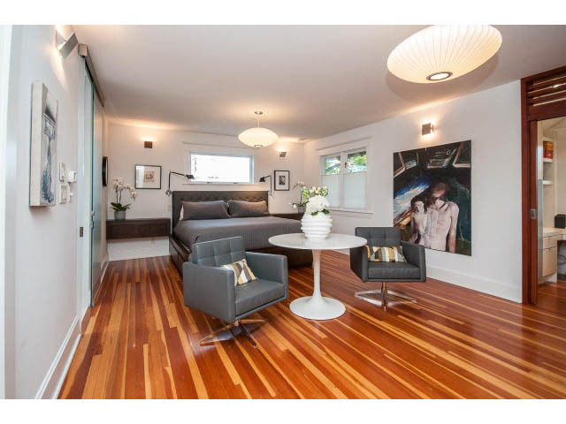 Furnished living room with hardwood floors and modern decor. - 1015 West 16th Ave, Vancouver West Side