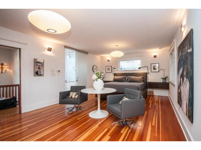 Furnished living room with hardwood floors and modern decor. - 1015 West 16th Ave, Vancouver West Side