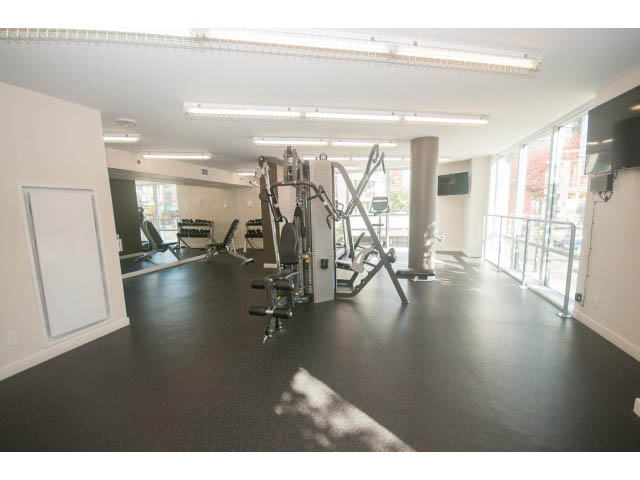 Spacious, modern gym with large mirrors and workout equipment. - 805 - 1009 Harwood Street, Vancouver Downtown