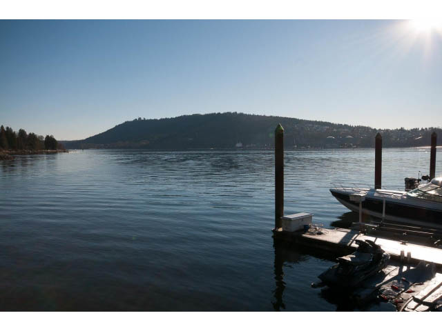 Furnished living room with a view of the lake and mountains. - 3765 Dollarton Hwy, North Vancouver