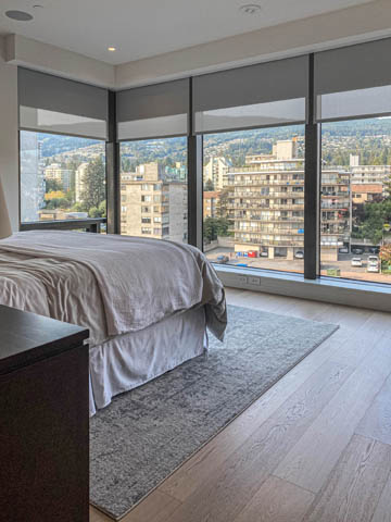 Spacious 2-bedroom condo with hardwood floors and a stunning city view. - 601 - 1355 Bellevue Ave, West Vancouver