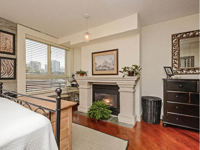 Furnished loft with hardwood floors, city view, and a cozy fireplace. - 509 - 1216 Homer Street, Vancouver Downtown