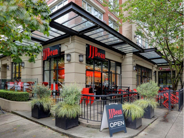 Bright and modern loft with JJBean coffee shop front and outdoor seating. - 509 - 1216 Homer Street, Vancouver Downtown