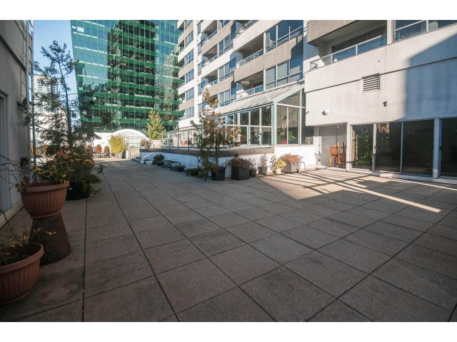 Furnished patio with potted plants and city views. - 1406 - 1060 Alberni Street, Vancouver Downtown