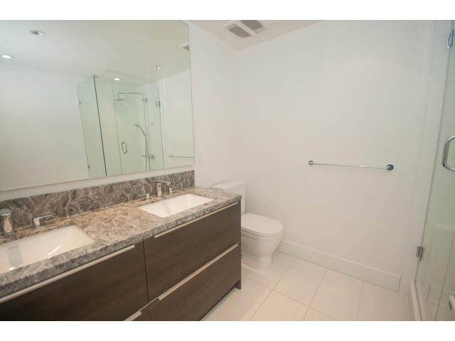 Furnished bathroom with granite countertops and modern fixtures. - 2401 - 1550 Fern Street, North Vancouver