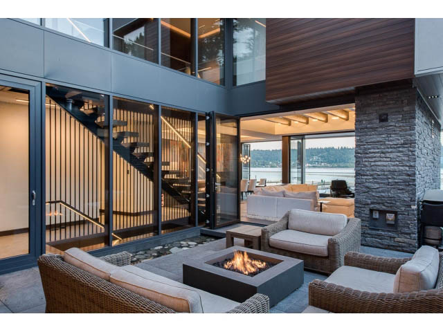 Furnished living room with a modern fire pit and panoramic views. - Address WITHHELD, Burnaby