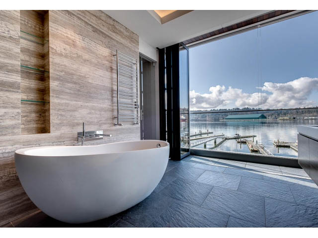 Spacious bathroom with a freestanding tub and a stunning view of the water. - Address WITHHELD, Burnaby