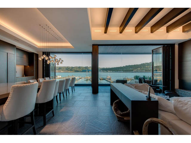Modern dining area with large windows and a view of the water. - Address WITHHELD, Burnaby