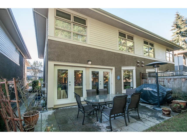Furnished patio with outdoor dining set and barbecue grill. - 17 - 3750 Edgemont Boulevard, North Vancouver