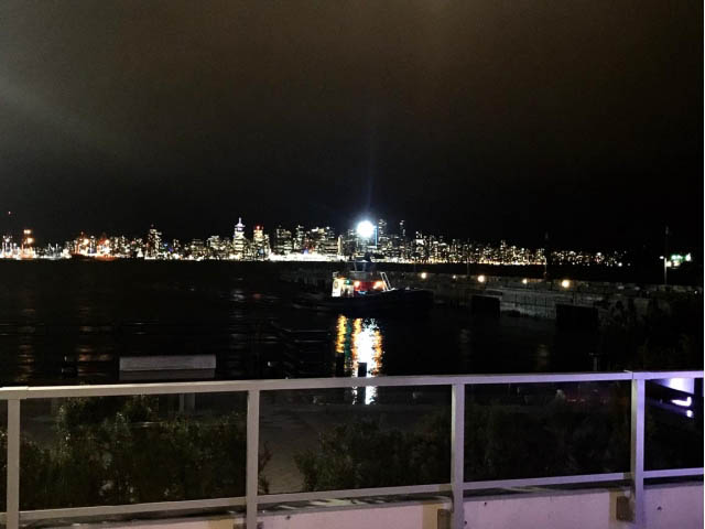 Bright balcony with stunning city view at night. - 105 - 175 Victory Ship Way, North Vancouver