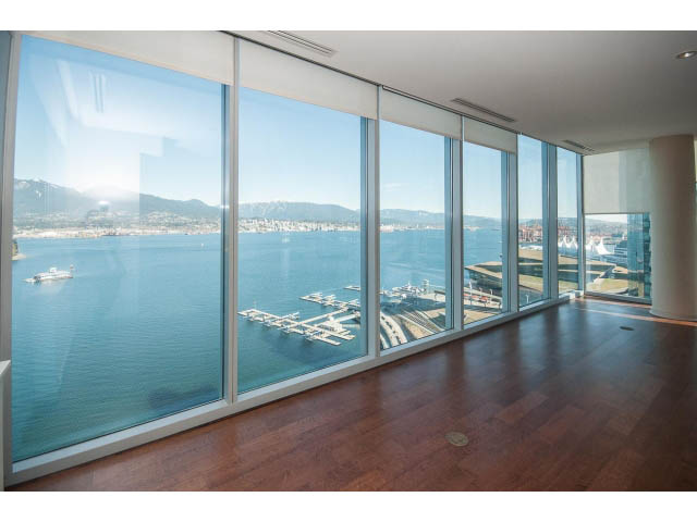 Bright living room with hardwood floors and stunning city view. - 2200 - 1169 W Cordova St, Vancouver Downtown