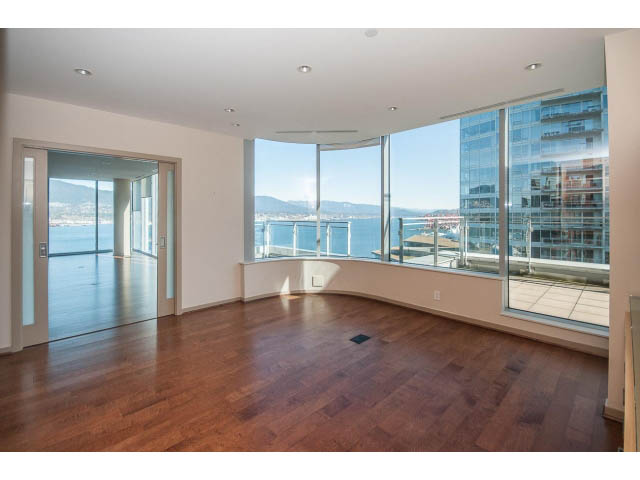 Spacious living room with hardwood floors and a stunning city view. - 2200 - 1169 W Cordova St, Vancouver Downtown