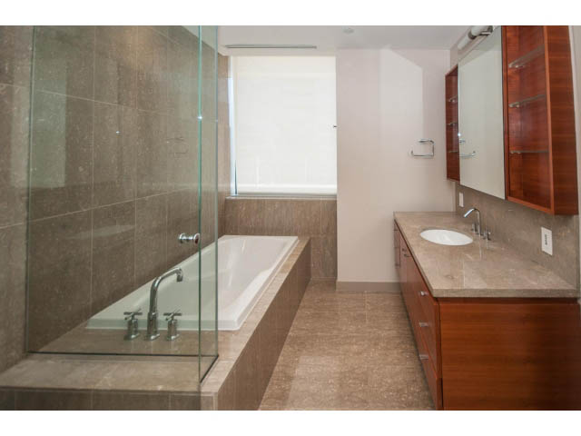 Furnished bathroom with modern fixtures and large glass shower. - 2200 - 1169 W Cordova St, Vancouver Downtown