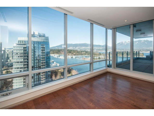 Bright living room with hardwood floors and a stunning city view. - 2200 - 1169 W Cordova St, Vancouver Downtown