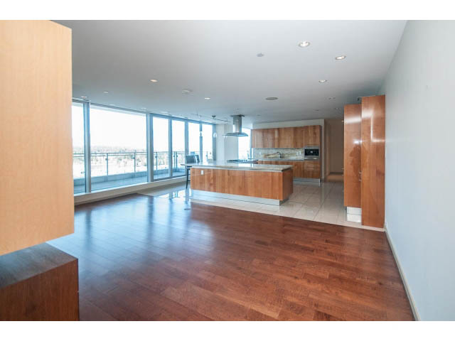 Bright kitchen with hardwood floors, city view, and modern cabinetry. - 2200 - 1169 W Cordova St, Vancouver Downtown