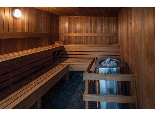 Spacious sauna with wooden benches and steam generator. - 2200 - 1169 W Cordova St, Vancouver Downtown