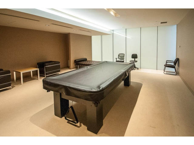 Furnished living room with modern furniture, large windows, and neutral decor. - 2200 - 1169 W Cordova St, Vancouver Downtown