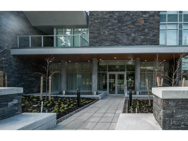 Furnished 2-bedroom + den condo with stone facade and modern glass doors. - 204 - 788 Arthur Erickson Pl, West Vancouver