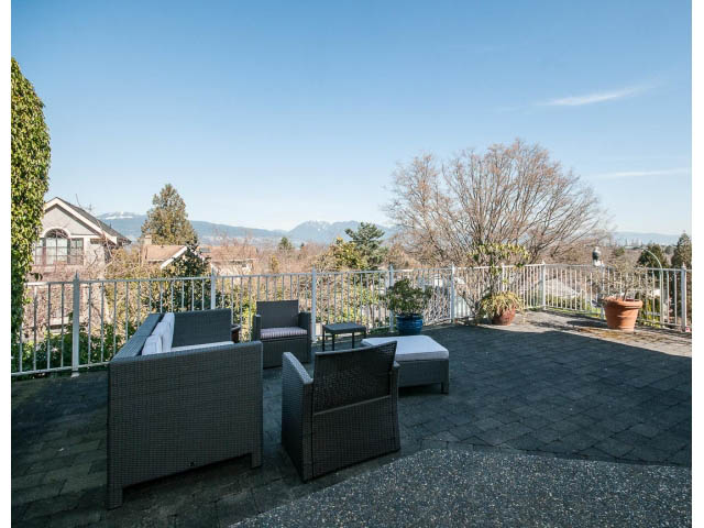 Furnished rooftop patio with outdoor furniture and city view. - 3131 Collingwood St, Vancouver West Side