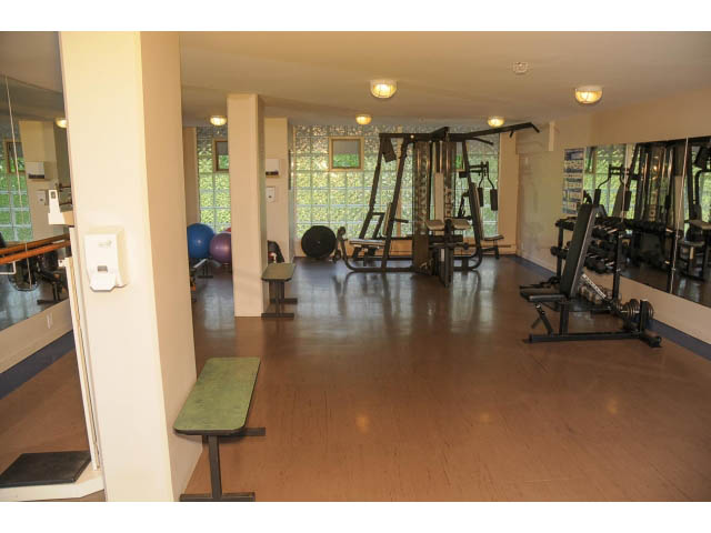 Furnished living room with hardwood floors and large windows. - 2404 - 1500 Hornby St, Vancouver Downtown