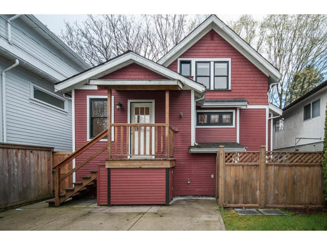 Bright 5-bedroom house with red siding and wooden deck, perfect for a family. - 769 West 20th Ave, Vancouver West Side