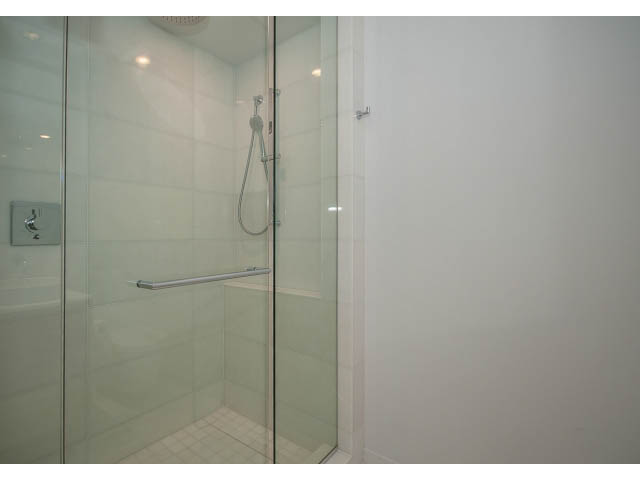 Bright bathroom with glass shower and modern fixtures. - 804 - 1171 Jervis St, Vancouver Downtown