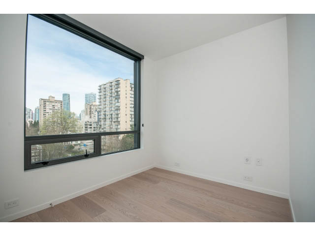 Bright living room with hardwood floors and city view. - 804 - 1171 Jervis St, Vancouver Downtown