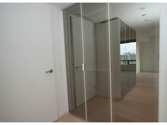 Bright living room with hardwood floors and city view. - 804 - 1171 Jervis St, Vancouver Downtown