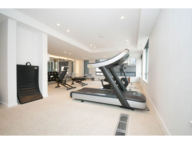 Bright and spacious gym with cardio machines and large windows. - 804 - 1171 Jervis St, Vancouver Downtown