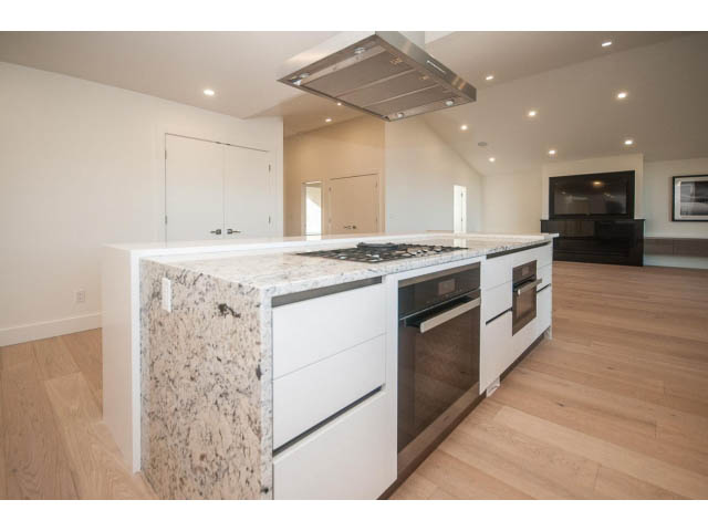 Bright kitchen with granite countertops and hardwood floors. - 5235 Headland Dr., West Vancouver