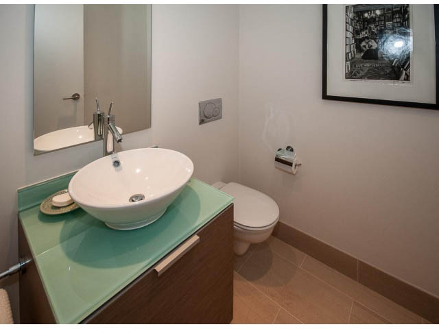 Furnished bathroom with teal countertops and modern sink. - 1902 - 1111 Alberni Street, Vancouver Downtown