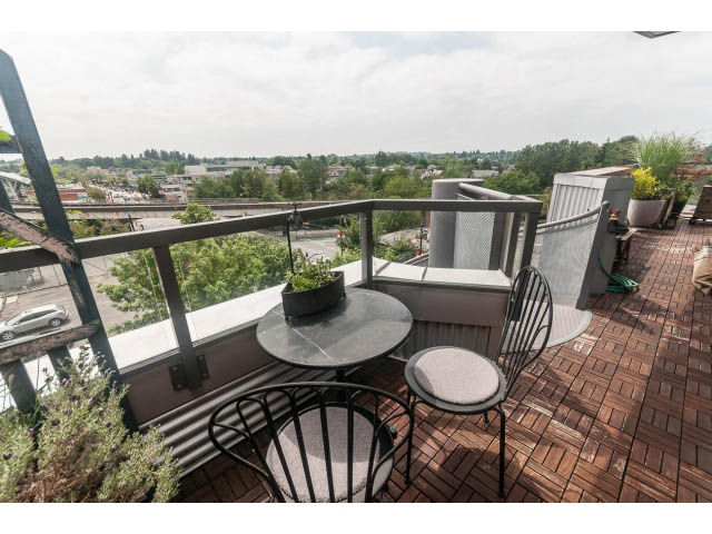 Bright loft with hardwood floors, city view, and furnished seating. - 4123 - 2250 Commercial Dr, Vancouver East Side