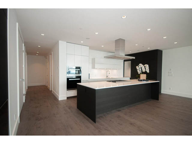 Bright kitchen with black and white countertops, hardwood floors, and a modern design. - Suite # Withheld - 2958  Burfield Place, West Vancouver