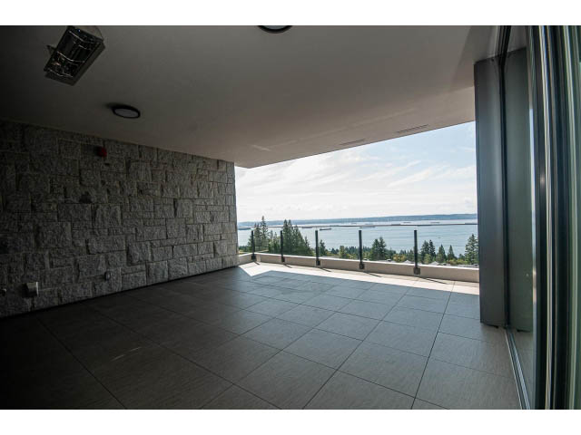 Spacious living room with large windows and a view of the water. - Suite # Withheld - 2958  Burfield Place, West Vancouver