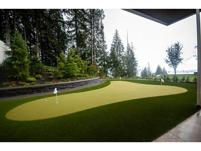 Golf putting green with artificial turf and trees in the background. - Suite # Withheld - 2958  Burfield Place, West Vancouver