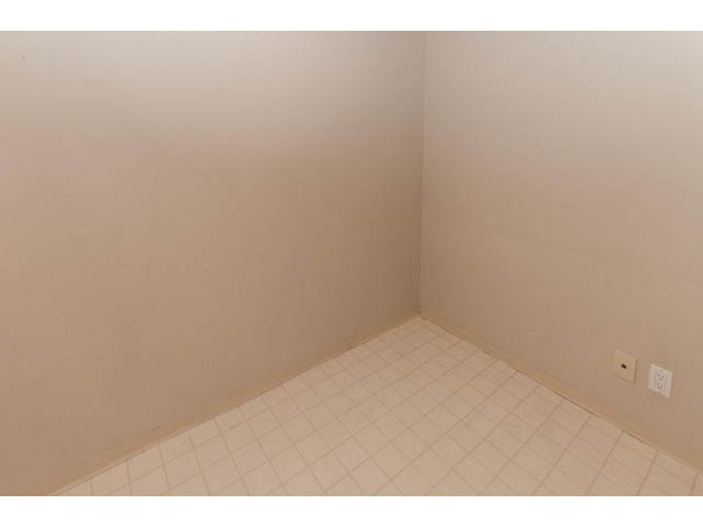 Empty corner with tiled floor and light switch visible. - 1506 - 1200 Alberni Street, Vancouver Downtown