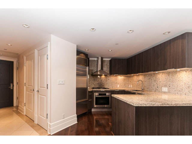 Bright kitchen with granite countertops and hardwood floors. - 104 - 533  Waters Edge Cres, West Vancouver