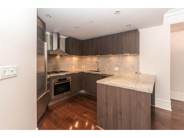 Bright kitchen with granite countertops and hardwood floors. - 104 - 533  Waters Edge Cres, West Vancouver