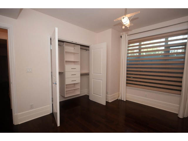 Spacious bedroom with hardwood floors and large closet. - 104 - 533  Waters Edge Cres, West Vancouver