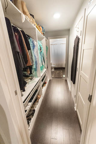 Spacious walk-in closet with ample storage and hardwood flooring. - 105 - 2020 W 12th Ave, Vancouver West Side