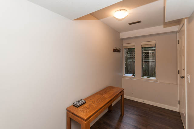 Bright kitchen with wooden countertops and hardwood floors. - 1528 Edgewater Lane, North Vancouver