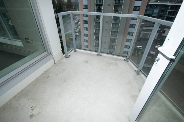 Spacious balcony with city view and glass railings. - 1001 - 175 West 2nd Street, North Vancouver