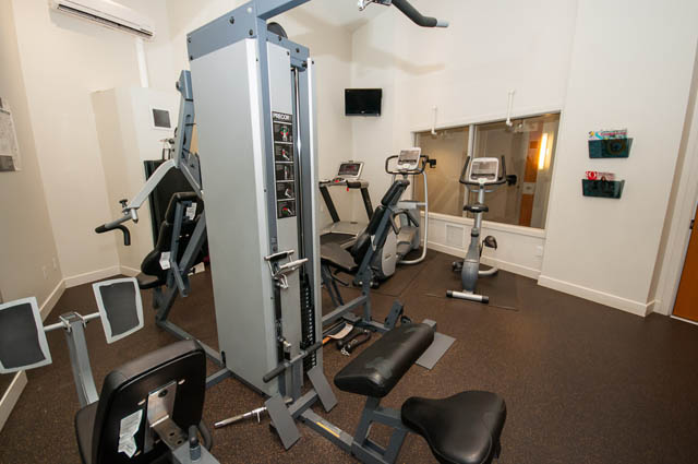 Fitness room with exercise equipment and mirrors. - 1001 - 175 West 2nd Street, North Vancouver
