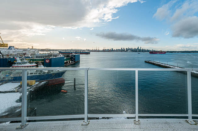 Bright balcony with stunning city view and waterfront access. - 702 - 185 Victory Ship Way, North Vancouver