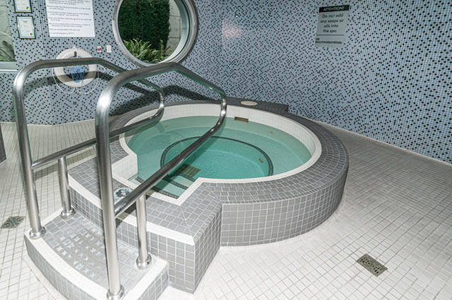 Spacious bathroom with mosaic tiles and a walk-in shower. - 601 - 1560 Homer Mews, Vancouver Downtown