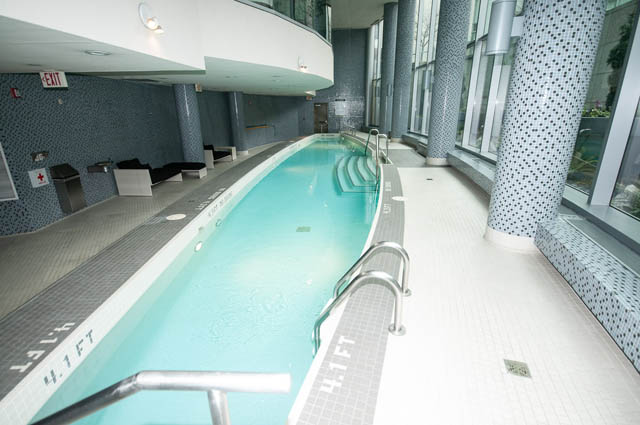 Spacious indoor pool with modern tiles and large windows. - 601 - 1560 Homer Mews, Vancouver Downtown