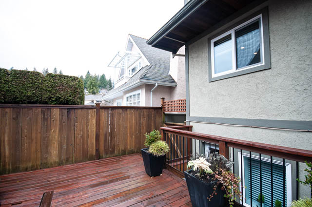 Furnished 1-bedroom suite with wooden deck and privacy fence. - SUITE - 2806 Munday Place, North Vancouver